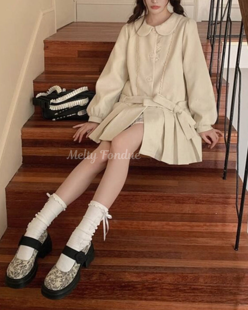 木漏れ日の物語を綴るお花柄コート