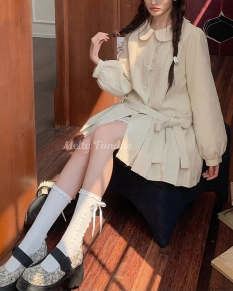 木漏れ日の物語を綴るお花柄コート