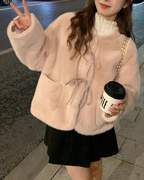 《あたたかさも可愛さも両立》ときめきの余韻をまとうリボンコート