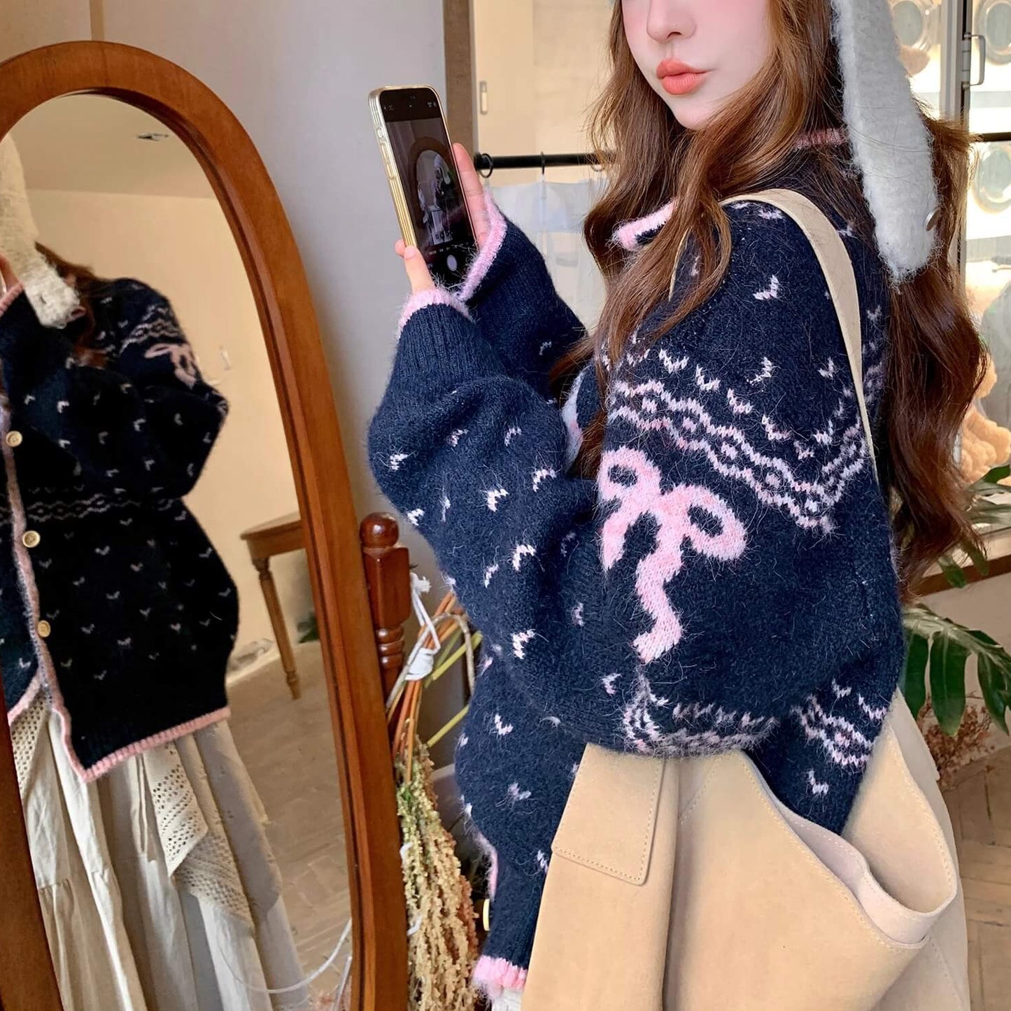 《癒しの冬ニット》でリボンと仔犬のメロディカーディガン（全2色）