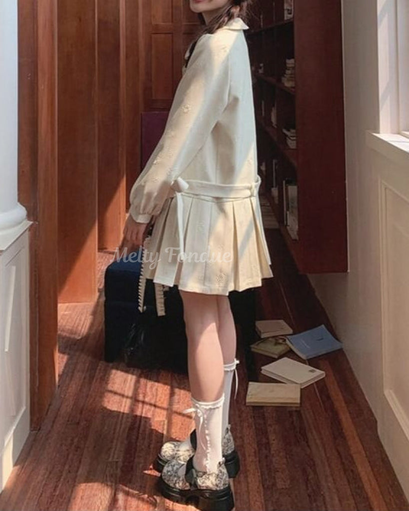 木漏れ日の物語を綴るお花柄コート