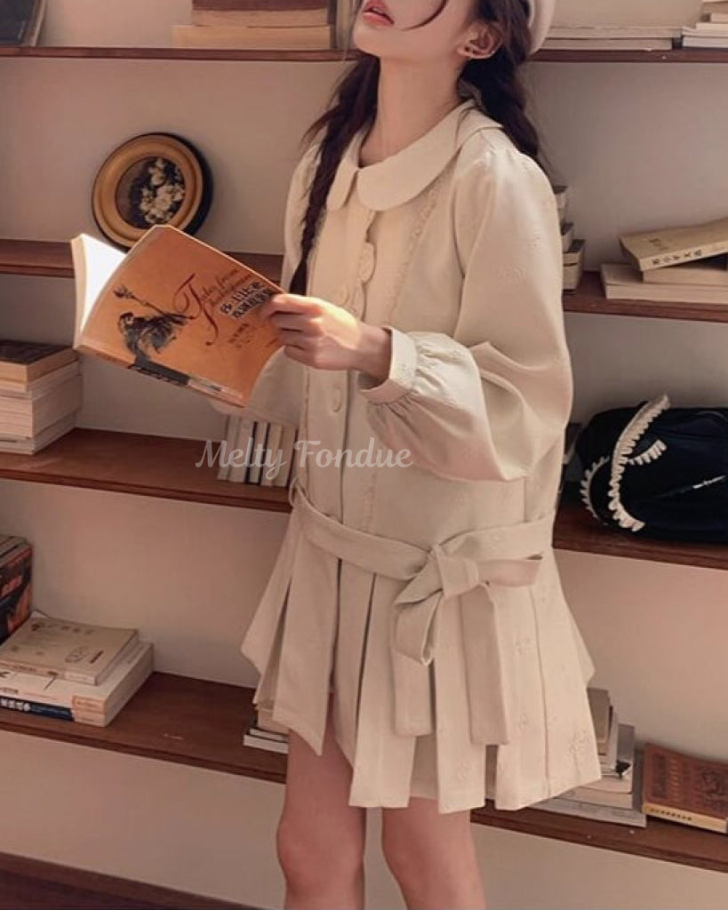 木漏れ日の物語を綴るお花柄コート