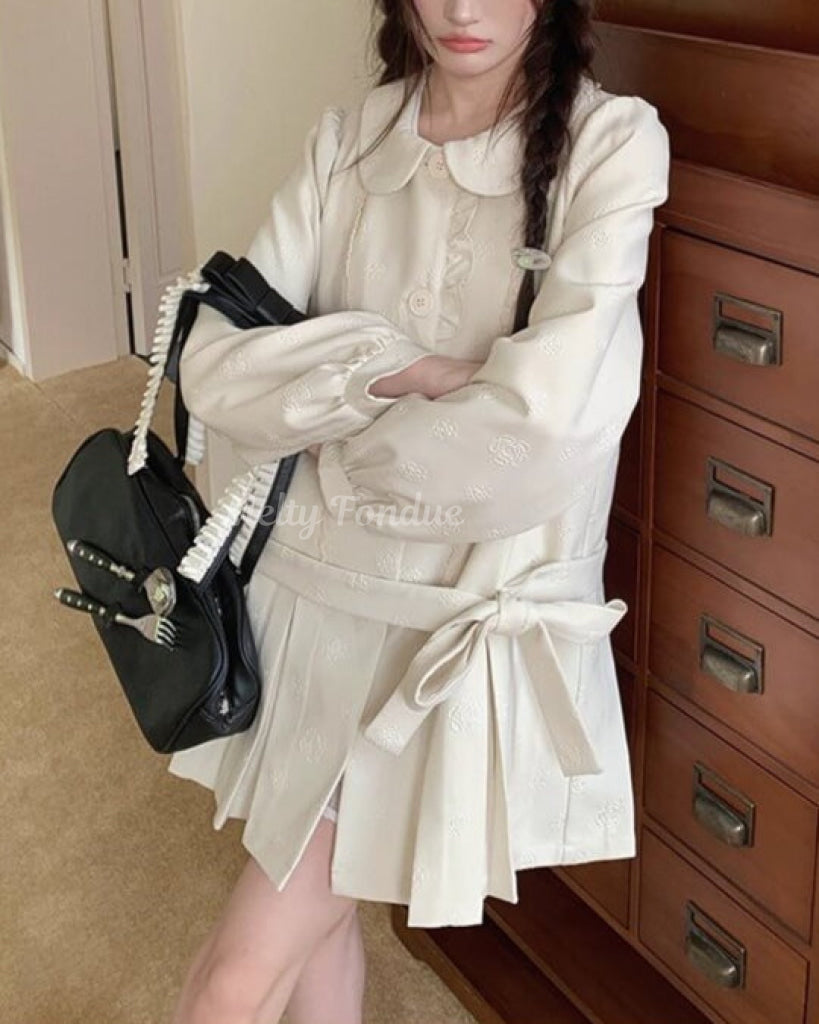 木漏れ日の物語を綴るお花柄コート