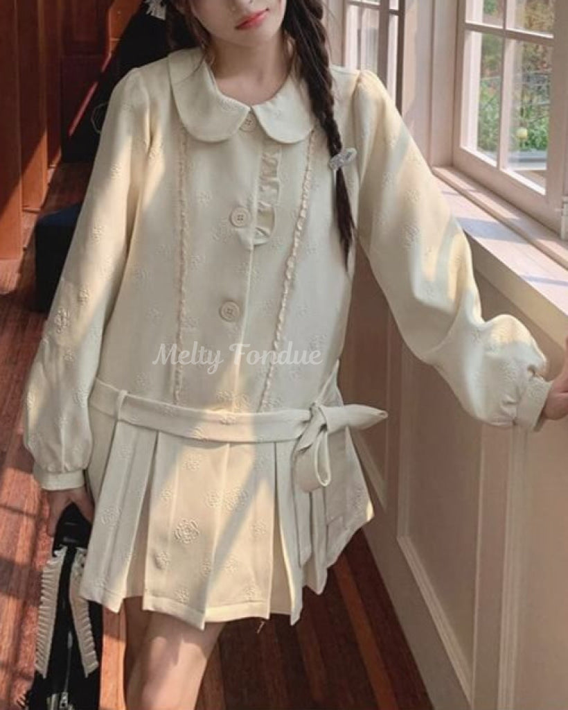 木漏れ日の物語を綴るお花柄コート