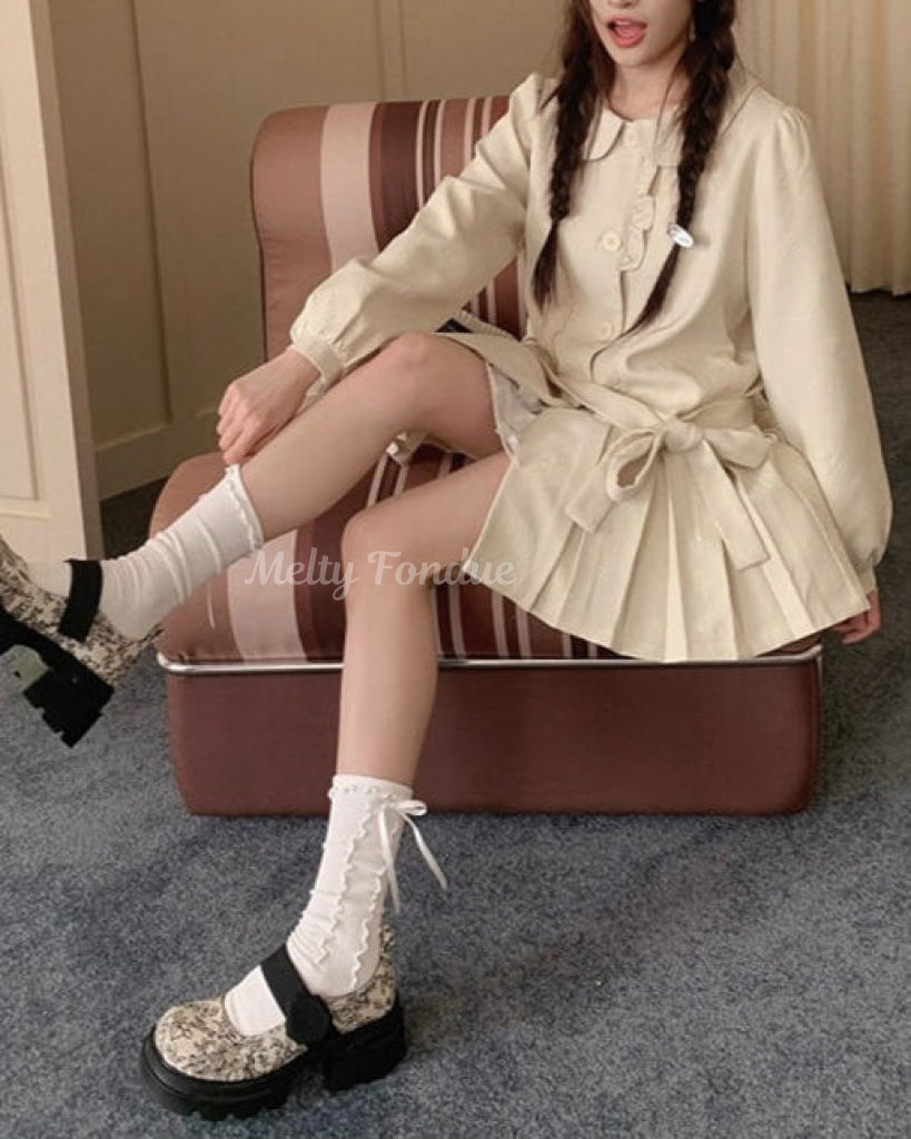 木漏れ日の物語を綴るお花柄コート