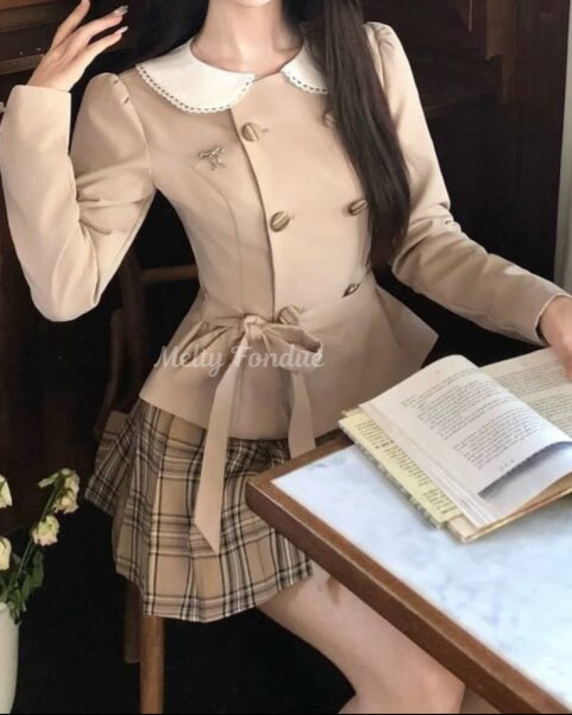 お茶会の約束に向かうペプラムジャケット